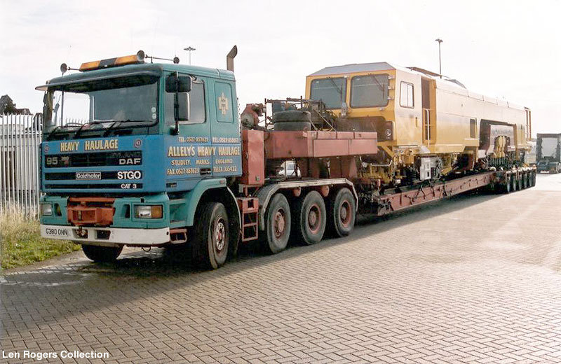 A Leyland or DAF need confirmation from wierdy. Carrying a rail maintenance locomotive.